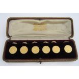 A cased set of six 18ct dress buttons with planished finish, in original fitted box for Alston's &