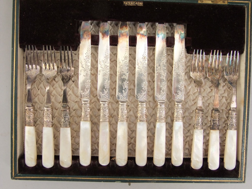 A leather cased canteen of fancy pearl handled flatware to include six knives and forks, together - Image 3 of 4