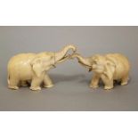 Two 19th century ivory models of elephants, 10cm max