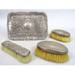 Victorian embossed silver comb tray, with acanthus detail, 27cm long, hallmarks indistinct, together