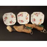 A set of three 19th century dessert plates with polychrome painted floral sprigs and sprays,