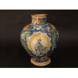 An 18th century Italian tin glazed earthenware Arbarello drugs jar with polychrome painted