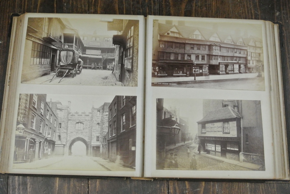 An album containing a quantity of late 19th century pictures of London, together with a mixed
