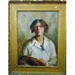 E Turner-Hill (early 20th century English school) - half length portrait of a young woman holding