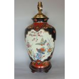 Chinese porcelain baluster vase lamp, decorated with polychrome panels of birds amidst foliage, upon