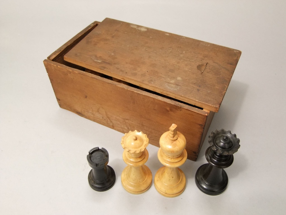 A chess set in the Staunton manner, in boxwood and stained finish, 8cm max