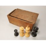 A chess set in the Staunton manner, in boxwood and stained finish, 8cm max