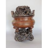 Impressive antique Chinese bronze sensor, with seal mark to base and three typical shaped feet, with