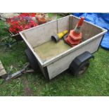 A small car trailer, steel framed with wooden body, 4ft x 3ft approx, excluding tow hitch