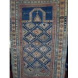 An old Persian rug with multi medallion centre upon a blue field within wide running borders, 140