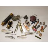 Two 19th century pocket telescopes, a number of vintage whistles, monocle, enamel badges, etc,