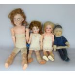 A mixed collection of antique porcelain headed dolls to include Heubach and Coppelsdorf bisque