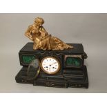 19th century black slate mantle clock, mounted by a gilt metal figure of a reclining maiden, the