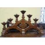 A Victorian ecclesiastical candle stand for seven candles, in the Gothic manner, 70cm high