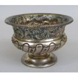 Edwardian silver pedestal bowl, the neck embossed with scrolled acanthus over a wrythen fluted bowl,