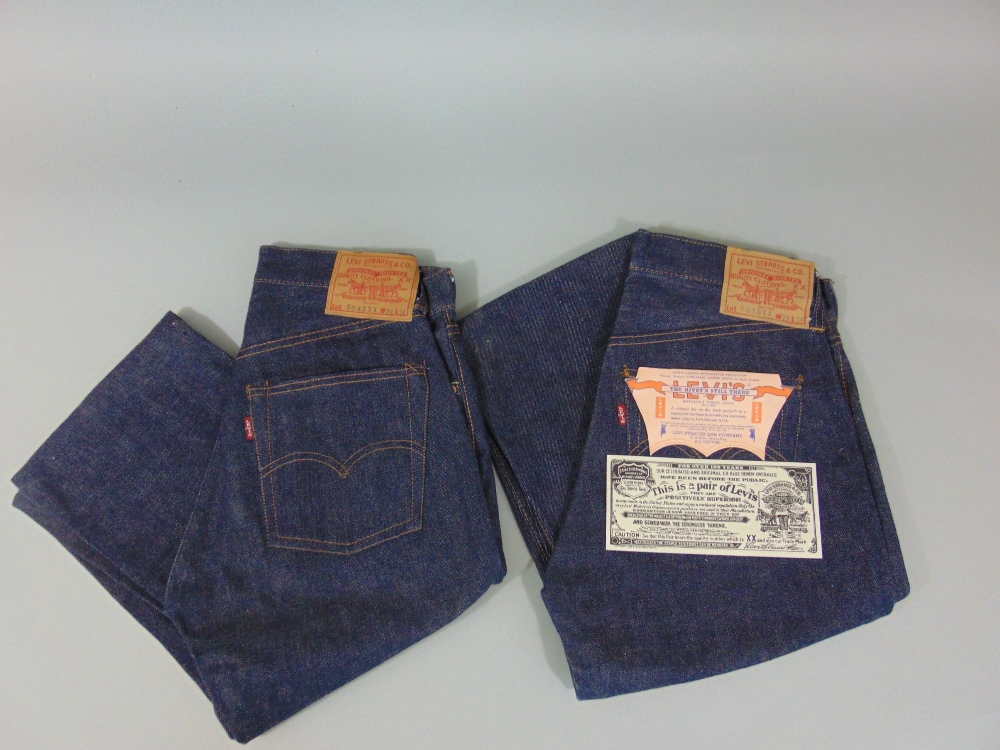 Two pairs of Levi jeans, one with original labels (1955-62) and copper backed concealed pocket