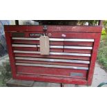 A Waterloo automatic red painted steel portable tool chest fitted with an arrangement of drawers and