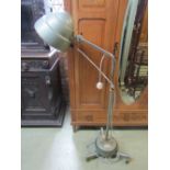 A Haniovia Ltd "The Prescription - Model 7 Heat Lamp" with domed adjustable shade and stem, raised