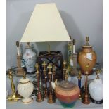 A large collection of modern table lamps to include various copper examples, Corinthian column