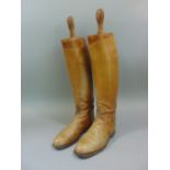 A pair of light tan Horace Batten leather men's hunting boots