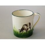 Wemyss Ware - Cylindrical mug 'Cow', impressed Wemyss, stamped Thomas Goode & Son,, height 9cm