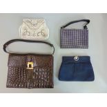 A collection of four Bags including a brown leather crocodile handbag with gold coloured clasp, a