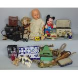 Four boxes of various miscellaneous items to include toys, dolls, ceramics to include Wade
