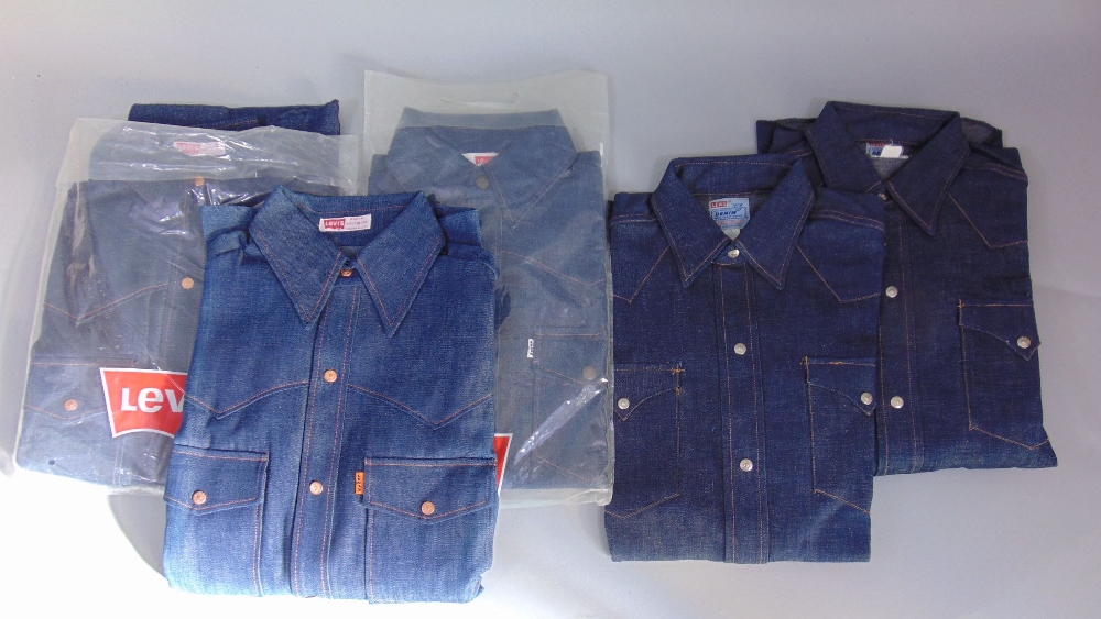 A collection of five Levi denim shirts, all in unused condition. Three are pre 1971 (with 2 in