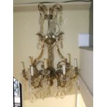 A substantial and good quality seven branch wall mounted light fitting, the back panel of lyre