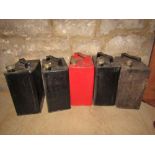 Five vintage Shell and other petrol cans, complete with brass screw caps