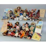 A mixed lot to include various vintage dolls, books on dolls, a child's tea set, a Worcester tea cup