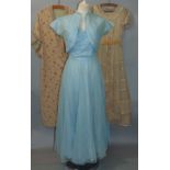 Powder blue ladies evening dress with full skirt and powder blue netting with matching bolero jacket