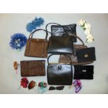 A collection of ladies handbags and evening bags including a black leather Riviera bag, a Le Soir