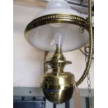 A Victorian brass hanging ceiling light with rope twist frame supporting a drop-in font and domed