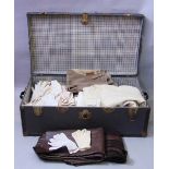 A large travelling trunk containing nineteen pairs of vintage jodhpurs (various periods), ten pairs