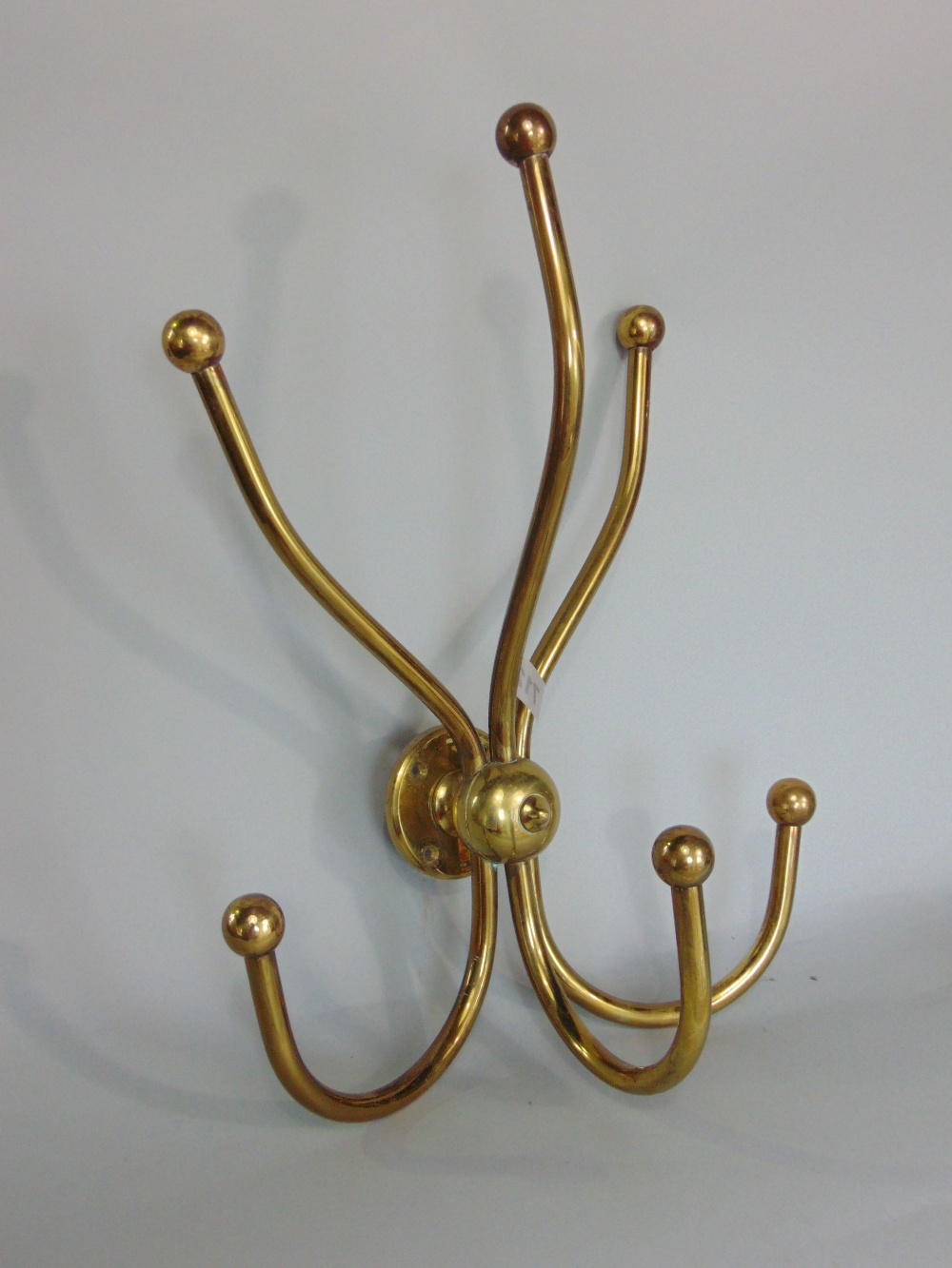 A mixed collection of brassware to include a three prong coat hook, two shoe horns and other - Image 2 of 2