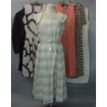 Collection of vintage ladies clothing consisting of four dresses, a petticoat and a two piece