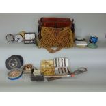 A box containing a vintage collection of fishing tackle to include a leather bag with various