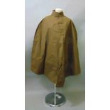 Three capes made by Burberry's, all in brown and unused described as self ventilating and