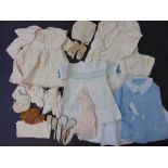 A large quantity of good quality vintage baby and young childrens clothes, including starched and