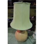 A glazed ceramic vase shaped table lamp with drawn neck