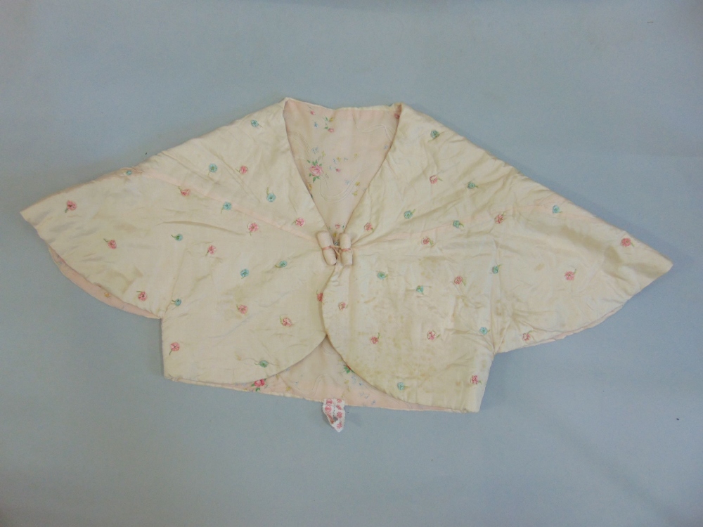 A pink silk bed jacket with hand stitching and applied flower decoration, a further bed jacket in - Image 2 of 4