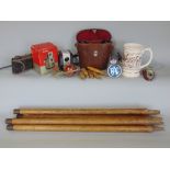 Collection of antique cricket stumps and bales, together with an over sized cup by Pilkingtons