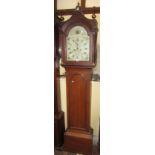 A Georgian oak longcase clock, the trunk with full length door, the arched hood with column