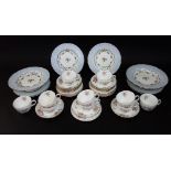 A collection of Minton Marlow pattern tea wares comprising ten cups, ten saucers and ten tea plates,