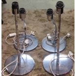 A pair of contemporary Art Deco style polished chromium plated table lamps with tall square and