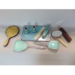 A collection of various dressing set items to include silver and tortoiseshell examples