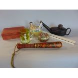 A box of interesting items to include a small wooden truncheon with gilt painted decoration, a