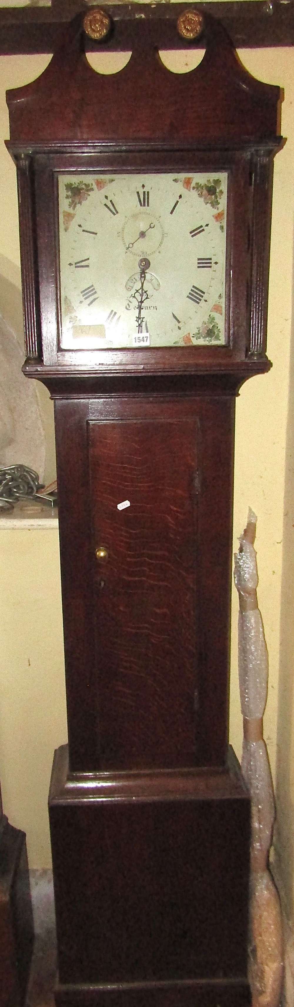 A small Georgian oak longcase clock, the square cut painted dial with 30 hour striking movement