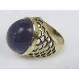 A vintage cabochon amethyst cocktail ring with pierced shank detail, stamped 18k, size M, 12g